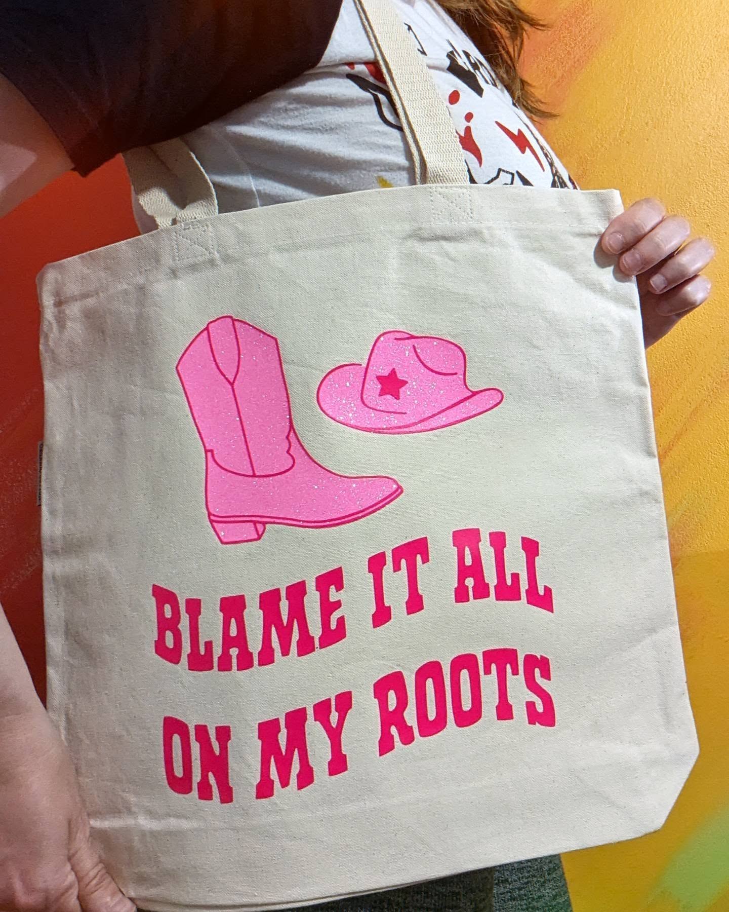 blame it all on my roots canvas tote bag