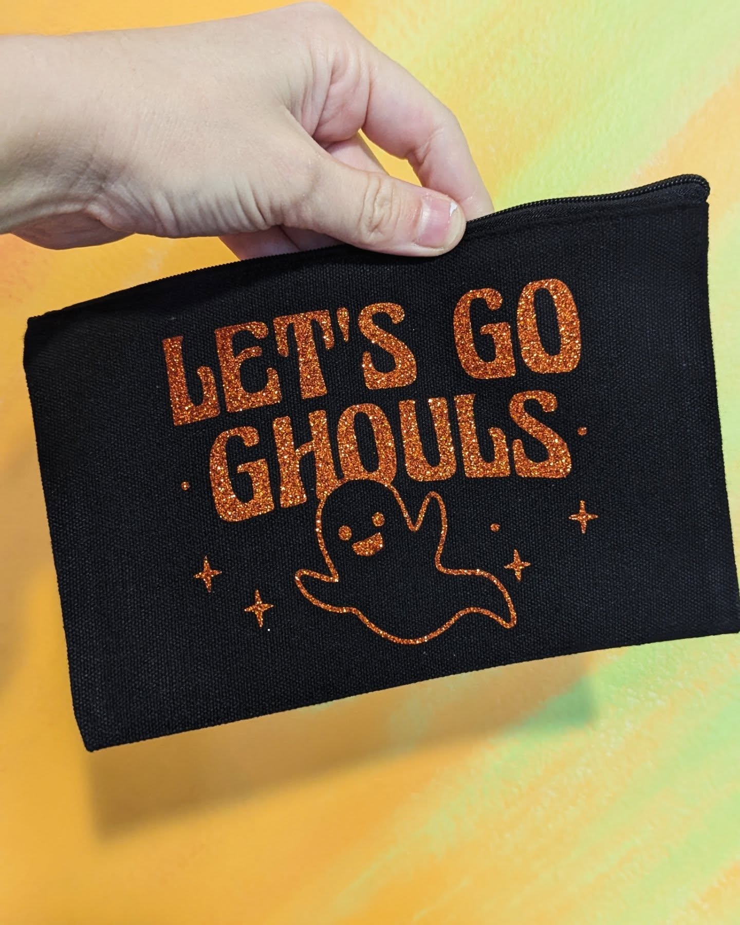 let's go ghouls clutch bag