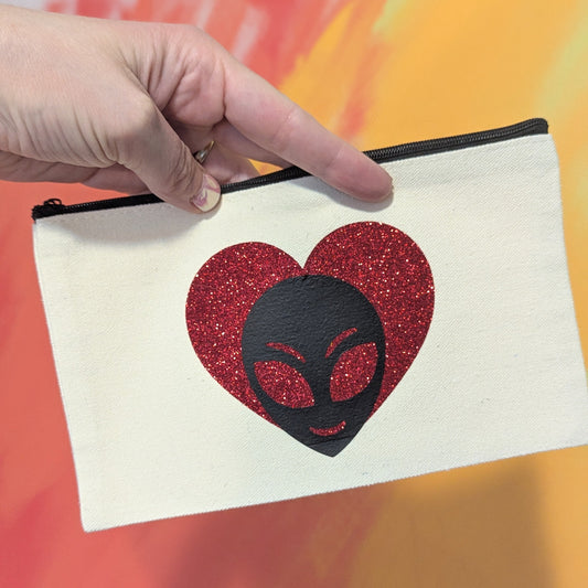 alien love zip clutch