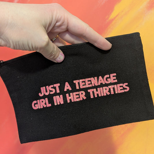 teenage millenial zip clutch