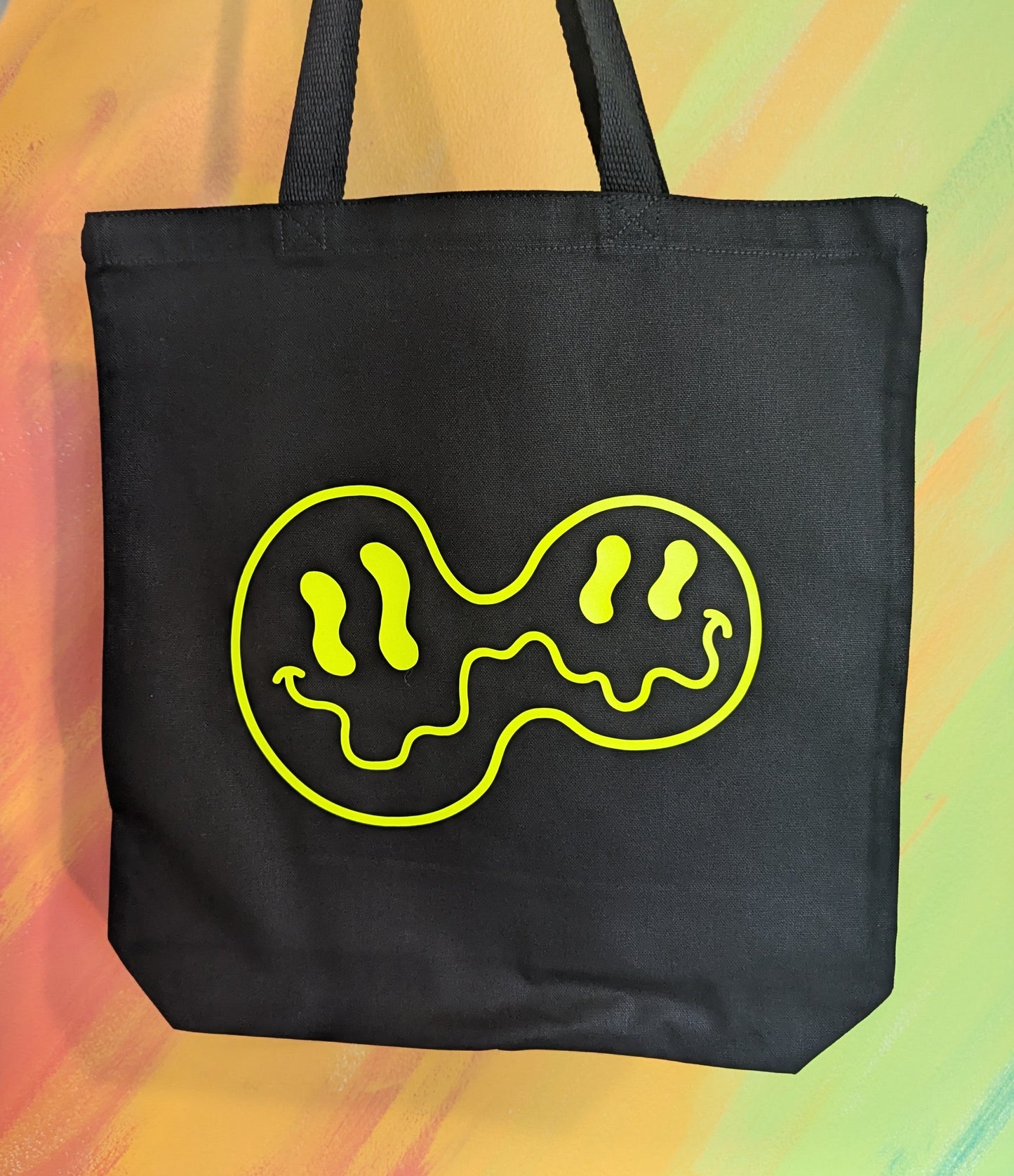 melted smiles canvas tote bag